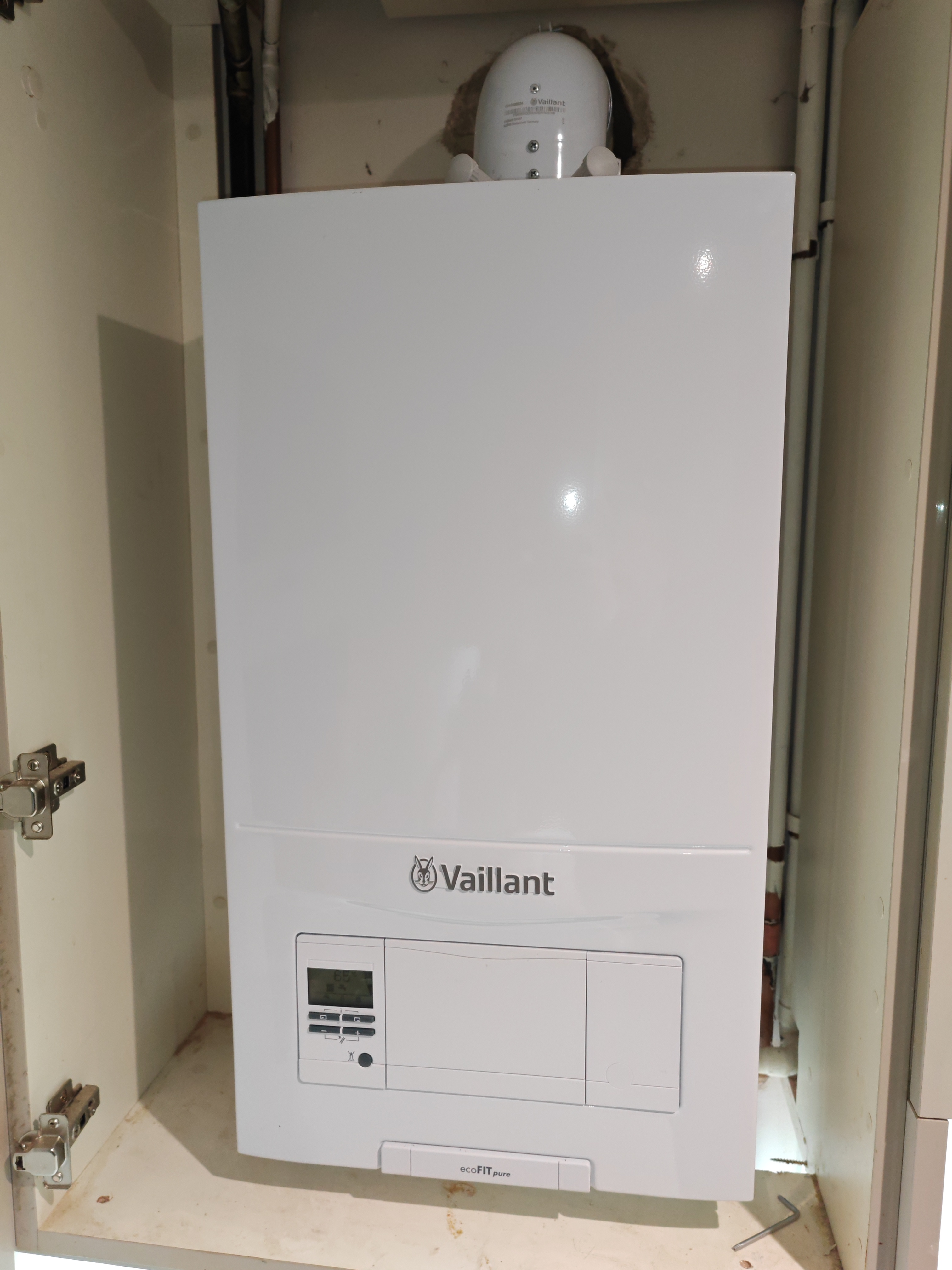 Real Vaillant ecoFIT pure boiler installation in a UK home — neat pipework and tidy finish